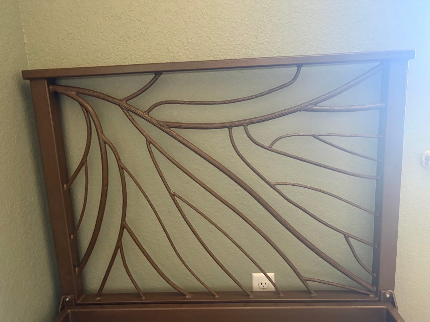 Artistic metal headboard with leaf pattern